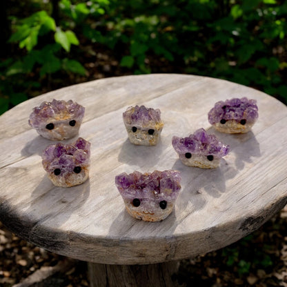 Amethyst Crystal Geode Rock Buddies with hand carved faces and black bad eyes.  Wax Apothecary