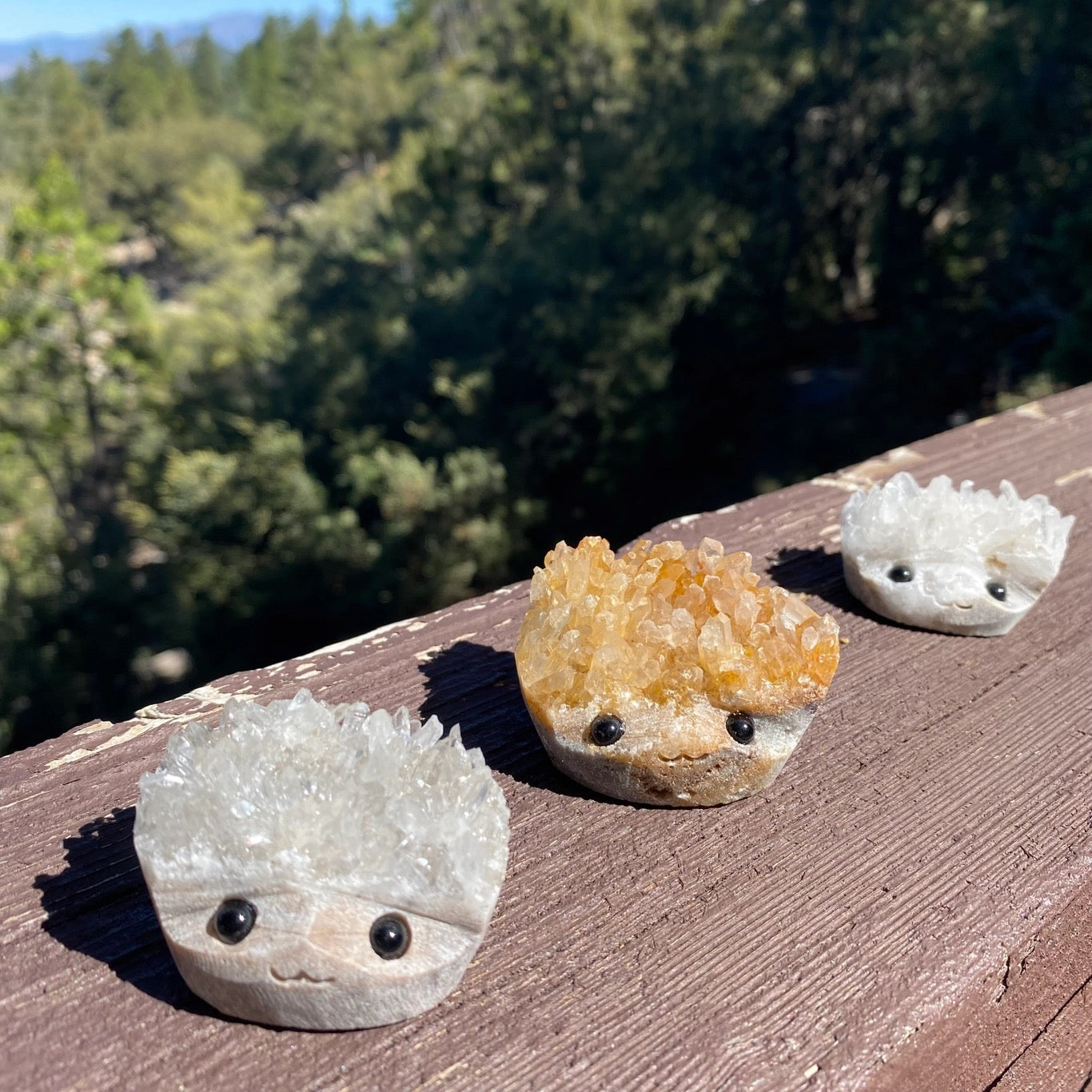 Crystal Geode Rock Buddies with hand carved faces and black ear eyes.  Wax Apothecary